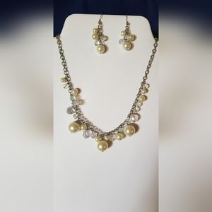 Multi clustered iridescent Crystals and pearls.